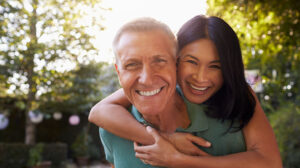 VGH-Happy-mature-couple-smiling-outdoors-in-nature-ss-The-Wellness-Molecule-Exploring-NMN-Benefits-for-Overall-Health