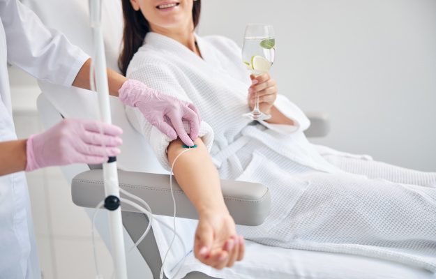 female-patient-undergoing-intravenous-IV-therapy-NAD-IV-Therapy-Frequency