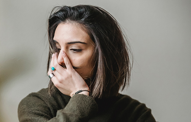 depressed-woman-sitting-in-room--Why-Stress-induced-Emotional-Instability-Is-Bad---px-body