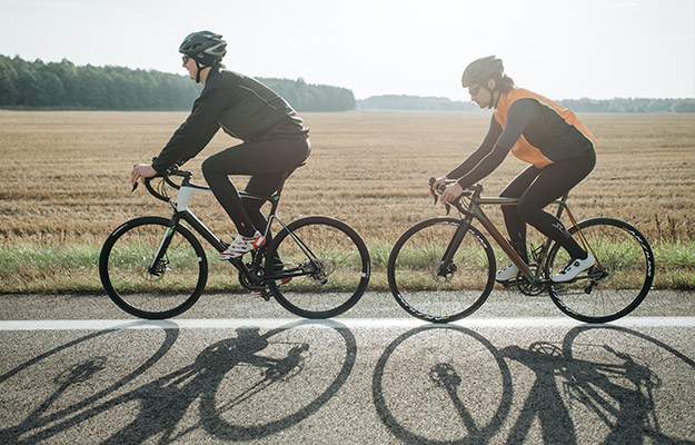 Two-People-Biking-on-the-Road---What-is-the-Best-Exercise-for-Arthritis---px-body