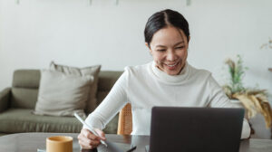 Woman-working-at-home-and-making-video-call-on-laptop-NAD+-Treatment-for-Chronic-Fatigue-Syndrome-Breaking-the-Exhaustion-Cycle-px-feat